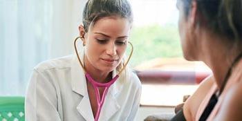 A Physician Assistant student working with a patient